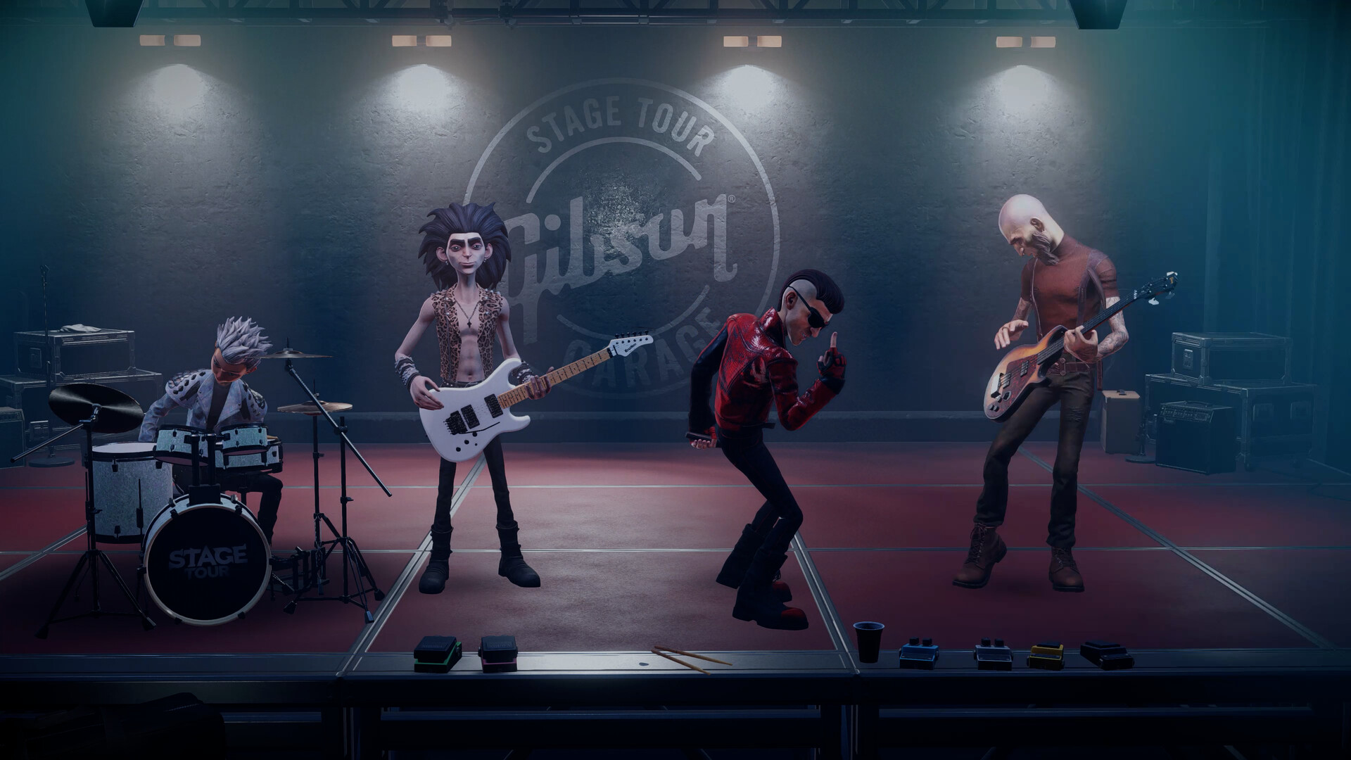 Official Stage Tour screenshot showing four bandmates in a guitar-filled rehearsal space